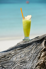 Fresh fruit cocktail juice on the beach