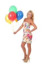 Fototapeta na wymiar young beautiful girl with balloons