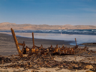 Devasted ship wreck on the beach