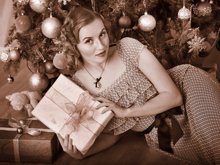 Woman receiving gifts.  Black and white retro.