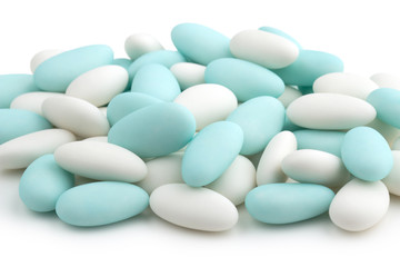 heap of blue and white sugared almonds