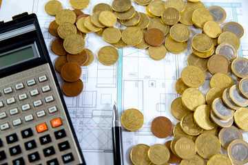 coin, concepts and ideas for saving money to buy a flat