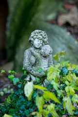 Fototapeta premium stone figurine female with child