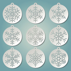 Paper christmas balls with puched snow flakes © GiorgioMorara