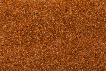 Close up flaxseed linseed brown red food background texture