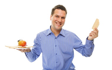 Healthy lifestyle man eating crispbread and apple