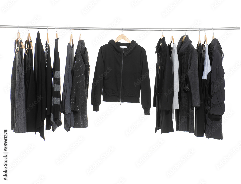 Wall mural variety of casual fashion clothing hanging on hangers