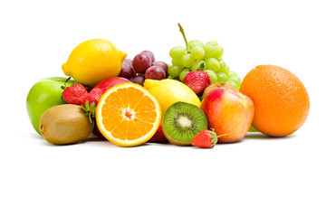 Close up of heap of fruit, isolated on white background