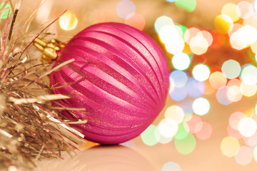 Colorful christmas ball on new year's lights bokeh background