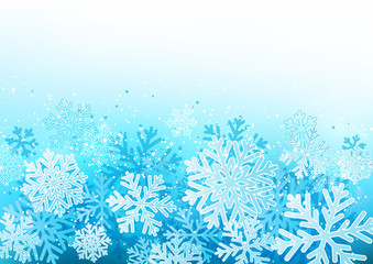 Fototapeta na wymiar Winter background with blue snowflakes
