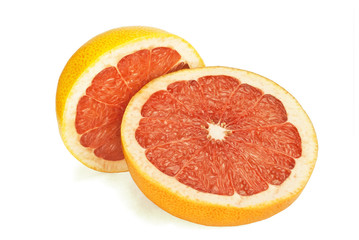 Naklejka na ściany i meble Две половины грейпфрута на изолированном белом фоне