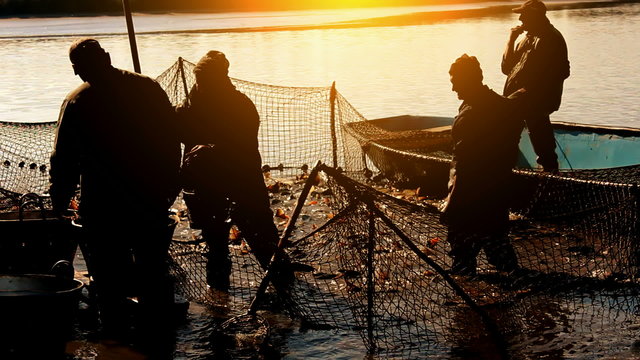 Fishermen at sunset