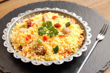 Couscous with lamb, vegetables and raisins
