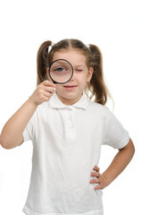 Girl with magnifying glass