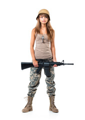 Soldier young beautiful girl dressed in a camouflage with a gun