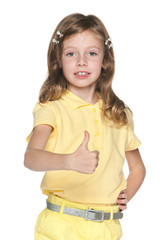 Girl in yellow blouse with her thumb up