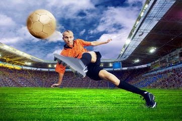 Naklejka premium Football player on field of stadium