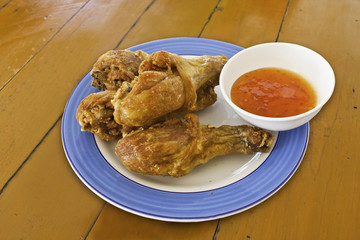 Thai fried chicken on white background.
