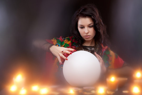 Witch with magic crystal ball