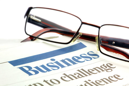 eyeglasses on a business papers