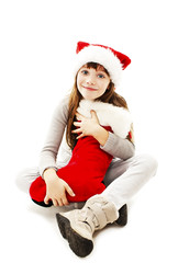 Little girl with Christmas gift on white background
