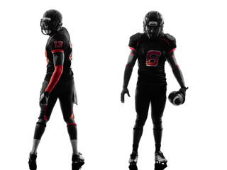 Fototapeta na wymiar two american football players posing silhouette