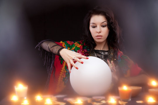 Witch with magic crystal ball