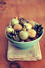Christmas decoration with nuts, cones, Christmas balls