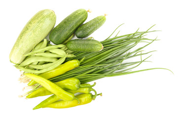 fresh green vegetables isolated on white