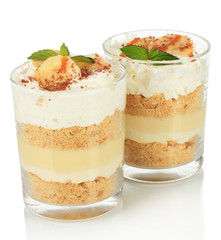 Delicious dessert with banana and caramel isolated on white