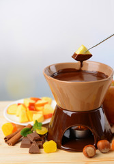 Chocolate fondue with fruits,