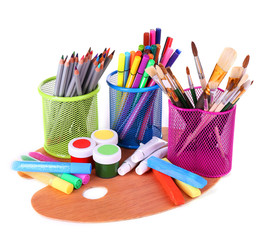 Composition of various creative tools isolated on white