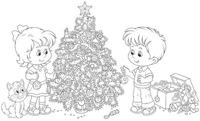 Little girl and boy decorate their Christmas tree