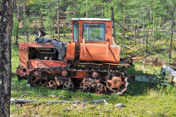 old tractor in the forest.