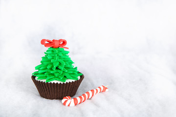 Christmas tree cupcake with white fondant frosting