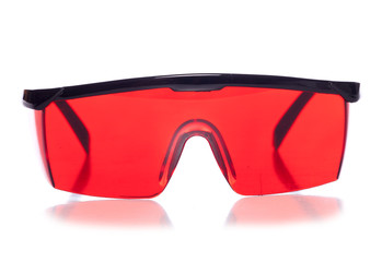 red protective shooting glasses studio cutout © Chris Brignell