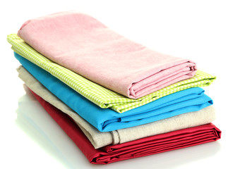 heap of cloth fabrics isolated on white
