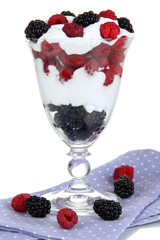Fototapeta na wymiar Natural yogurt with fresh berries isolated on white