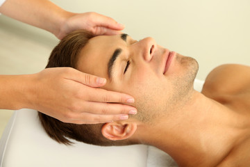 Obraz na płótnie Canvas Man having head massage close up