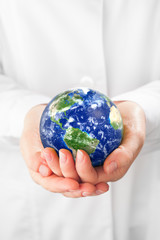 globe in hands