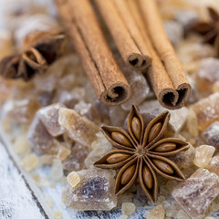 Cinnamon sticks and star anise on brown sugar