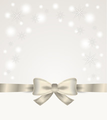 silver ribbon and bow with stars and snow flakes