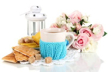 Cup of tea with lemon isolated on white