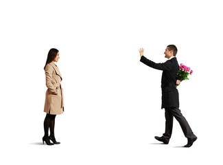 man looking at woman and greeting