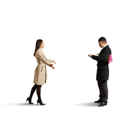 woman going to man looking at the watch