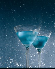 glasses of  fresh cocktail with ice on bar table