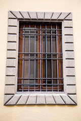 Old Wood Window in Plaster with Iron Bars