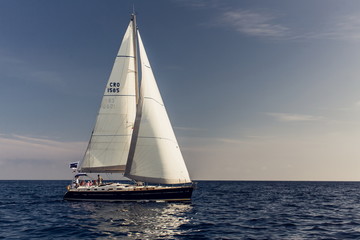 Sailing ship yachts with white sails