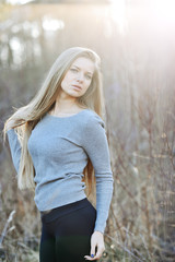 Portrait of blond woman on nature