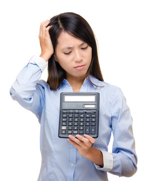 Asian woman feel sad and trouble with calculator